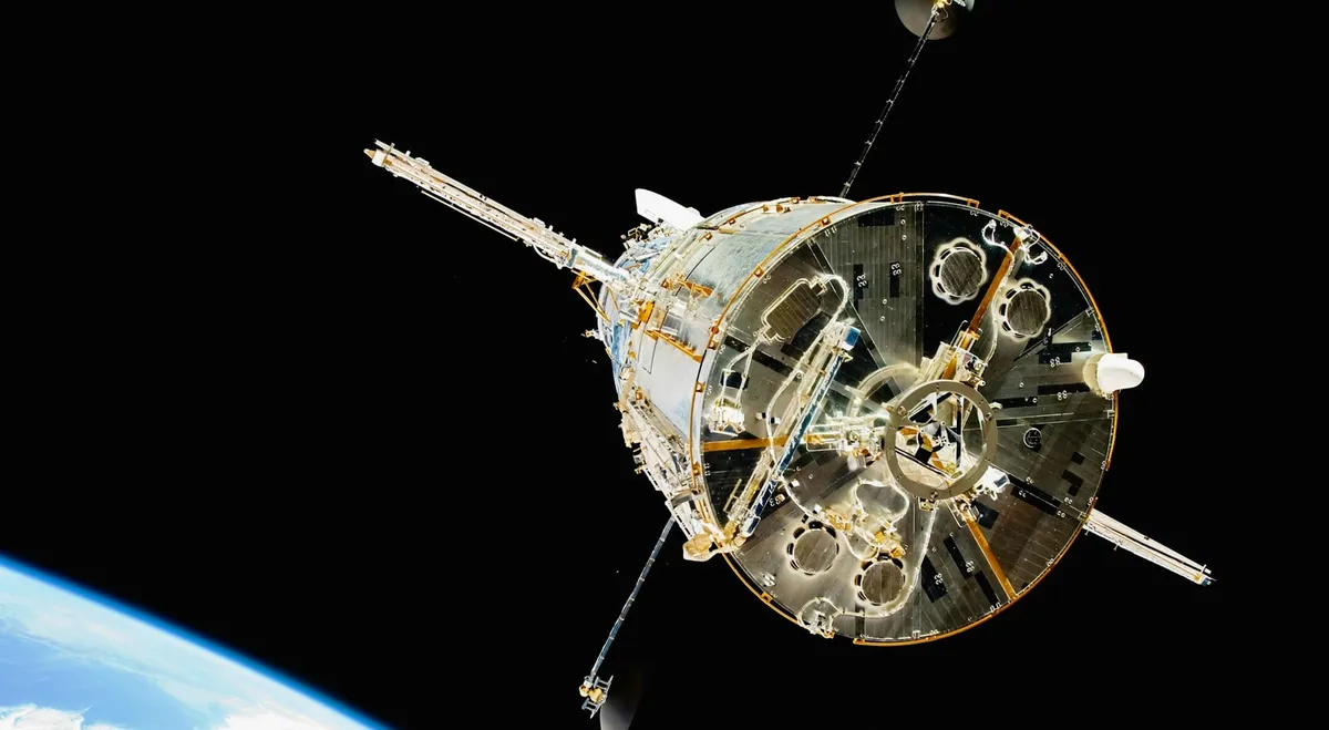 A satellite in orbit above the Earth
